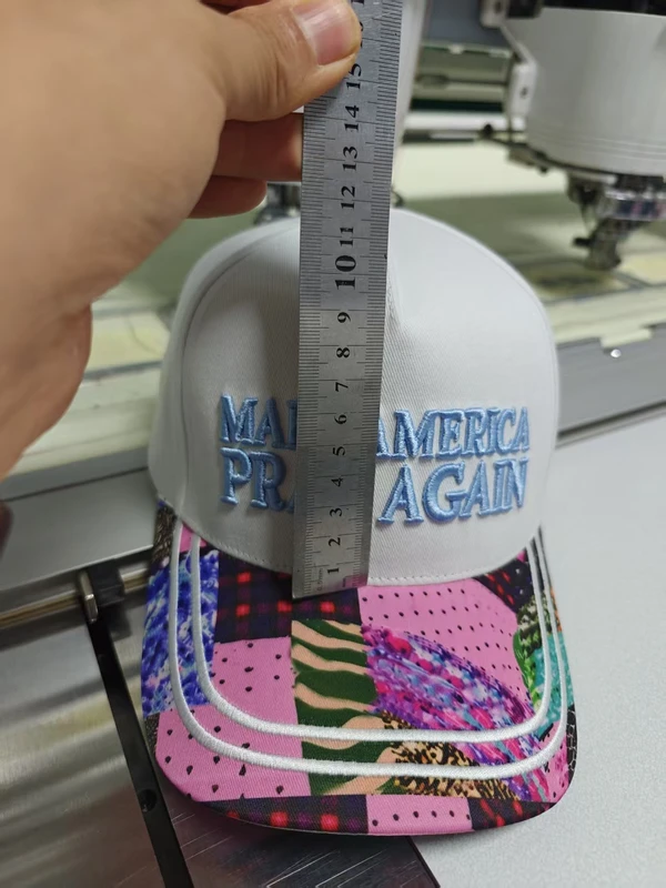 Second angle showing a ruler alongside the white crown above a colourful visor