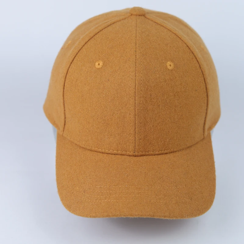 Plain tan suede-look cap shown from the front