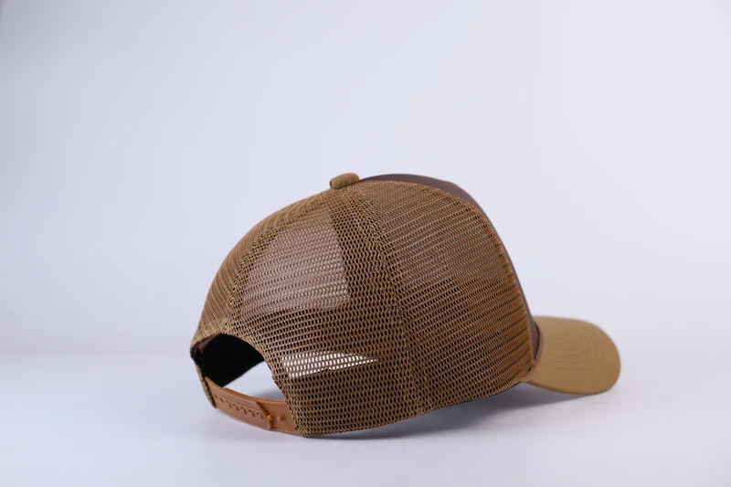 Rear view of the brown mesh trucker cap showing the matching tan plastic snapback