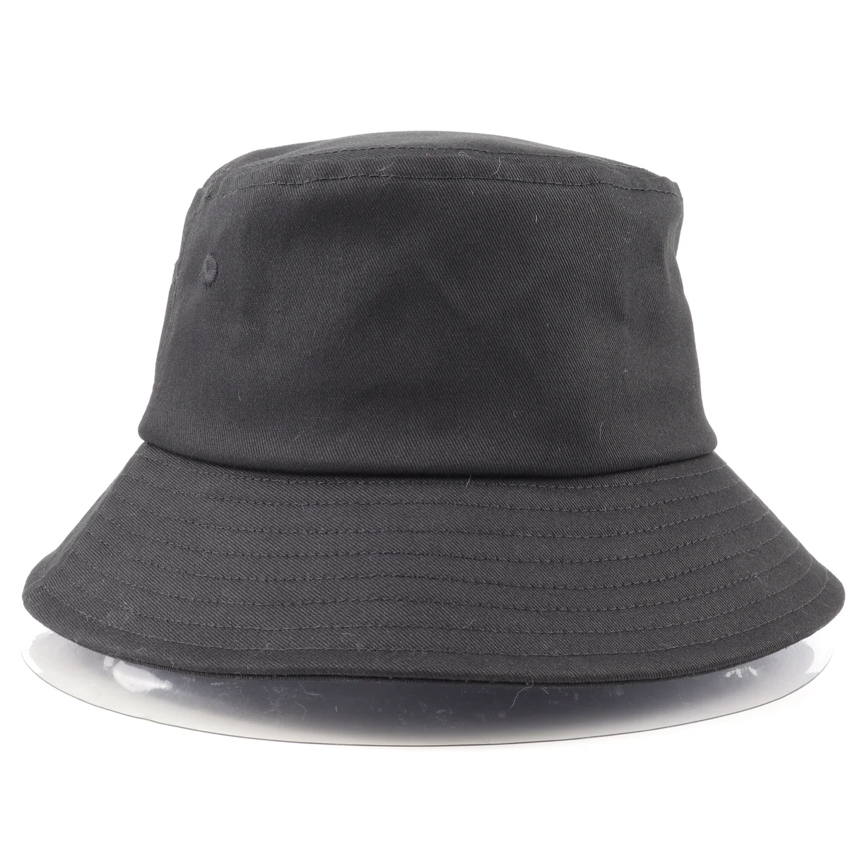 Front view of plain charcoal black bucket hat with circular brim stitching