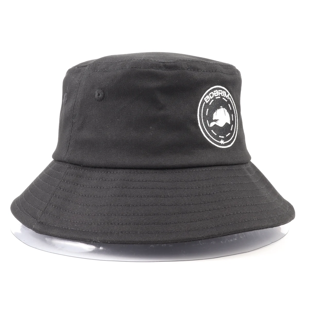 Front view of charcoal bucket hat with white circular BDBRIM embroidered logo