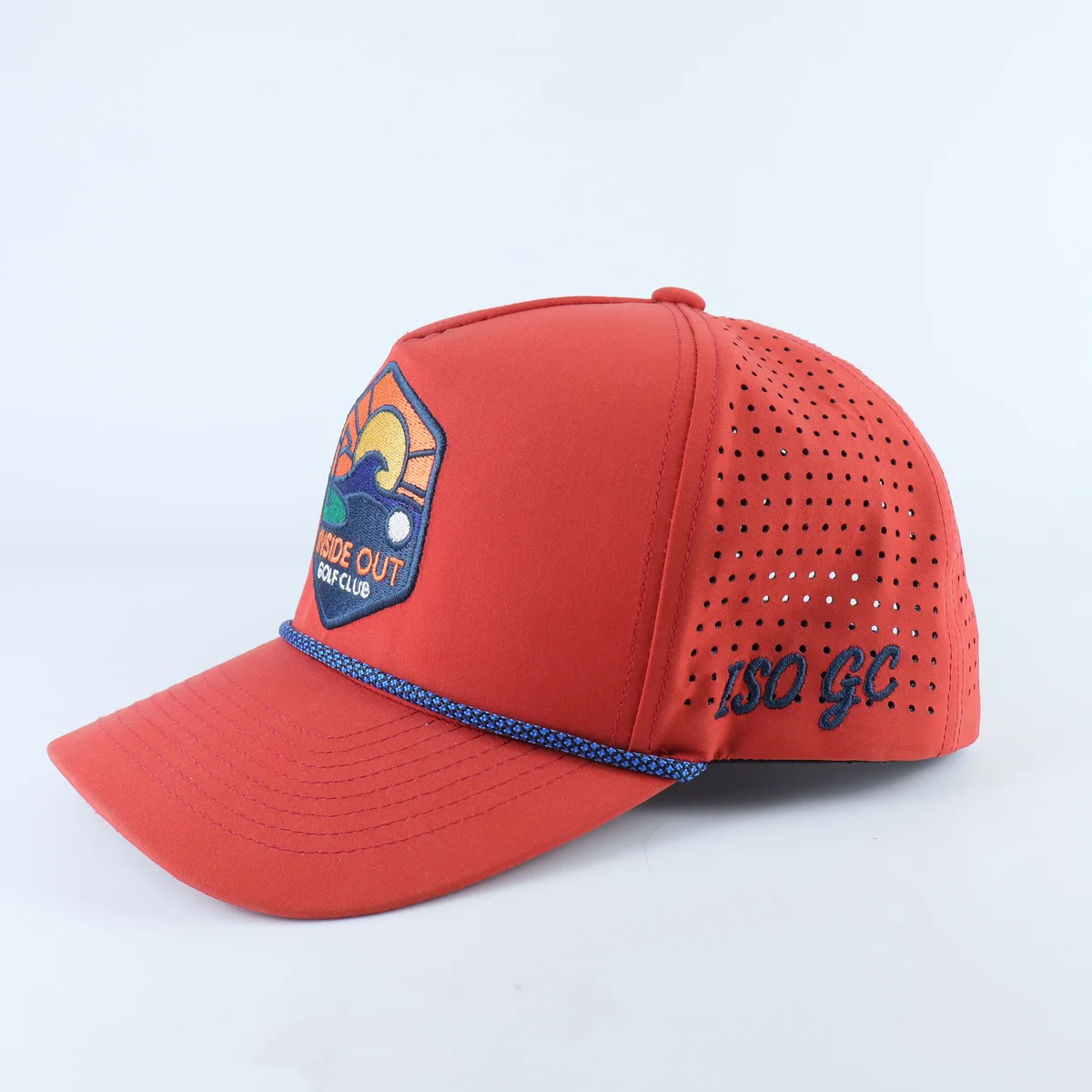 Alternate view of coral golf cap with front embroidered crest and rope trim