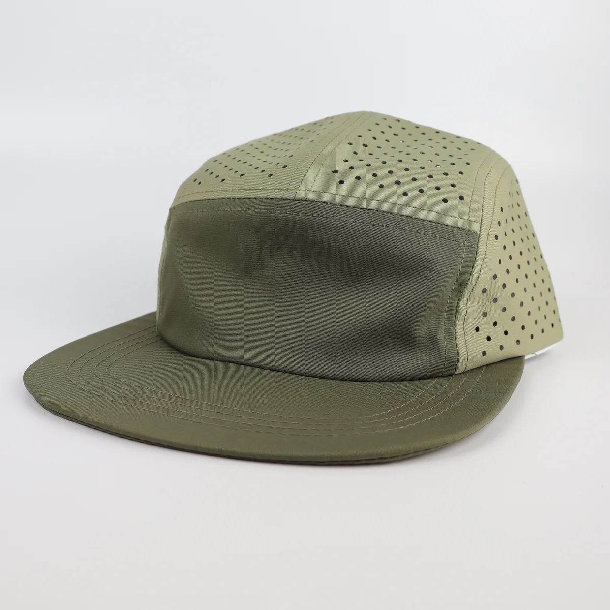 Olive five-panel cap with contrasting perforated upper panels and flat green brim