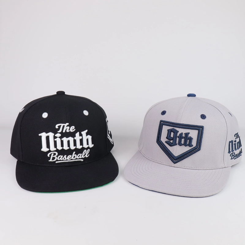 Black and light gray flat-brim caps with large raised front embroidery